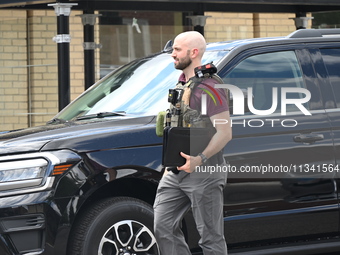 An FBI agent is at the scene on W. Belmont Ave. where two vehicles are being recovered that were used in the bank robbery. Two suspects are...