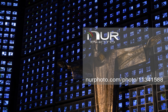 A statue of Jesus Christ is standing inside the Kaiser Wilhelm Memorial Church in Berlin, Germany, on June 18, 2024. 