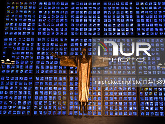 A statue of Jesus Christ is standing inside the Kaiser Wilhelm Memorial Church in Berlin, Germany, on June 18, 2024. (