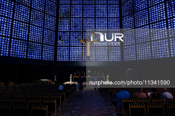 A statue of Jesus Christ is standing inside the Kaiser Wilhelm Memorial Church in Berlin, Germany, on June 18, 2024. 