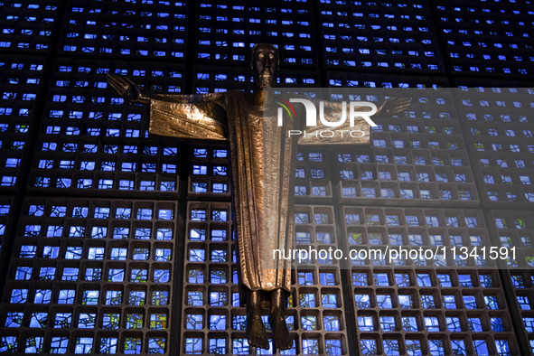 A statue of Jesus Christ is standing inside the Kaiser Wilhelm Memorial Church in Berlin, Germany, on June 18, 2024. 