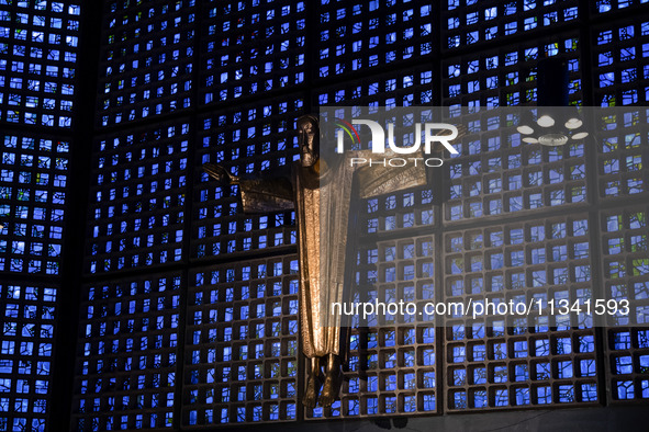 A statue of Jesus Christ is standing inside the Kaiser Wilhelm Memorial Church in Berlin, Germany, on June 18, 2024. 