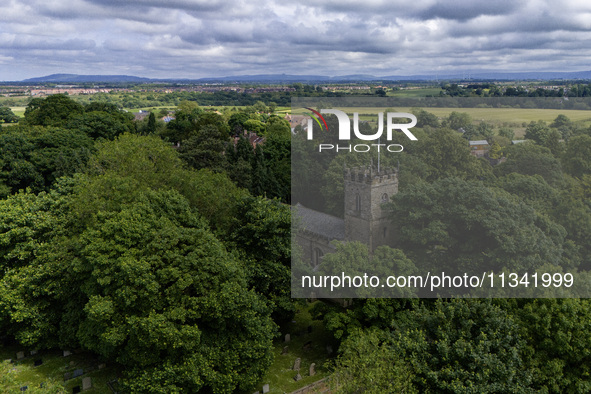 An aerial view is showing St John the Baptist Church in Egglescliffe, Stockton on Tees, England, on June 18, 2024. 