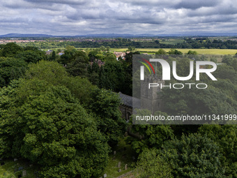 An aerial view is showing St John the Baptist Church in Egglescliffe, Stockton on Tees, England, on June 18, 2024. (