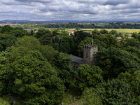 An aerial view is showing St John the Baptist Church in Egglescliffe, Stockton on Tees, England, on June 18, 2024. (