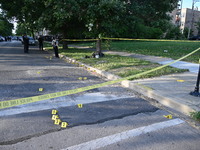 Shell casings are being located at the crime scene on Tuesday afternoon. Two men are in serious condition after being shot in Chicago, Illin...