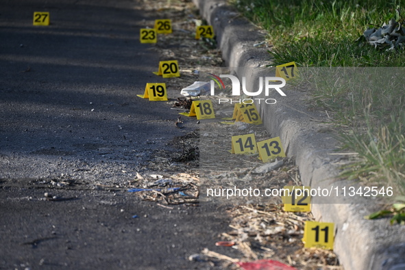 Shell casings are being located at the crime scene on Tuesday afternoon. Two men are in serious condition after being shot in Chicago, Illin...