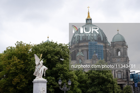 Tourists are visiting Berlin Cathedral in Berlin, Germany, on June 19, 2024. 