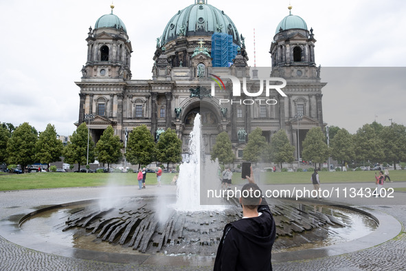 Tourists are visiting Berlin Cathedral in Berlin, Germany, on June 19, 2024. 