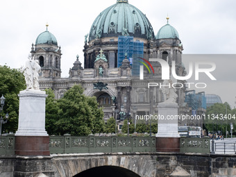 Tourists are visiting Berlin Cathedral in Berlin, Germany, on June 19, 2024. (