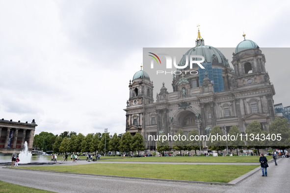 Tourists are visiting Berlin Cathedral in Berlin, Germany, on June 19, 2024. 