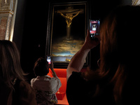 People are taking pictures of ''Dali's Christ'' at San Marcello al Corso Church in Rome, Italy, on June 19, 2024. Salvador Dali's famous pai...