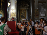 People are taking pictures of ''Dali's Christ'' at San Marcello al Corso Church in Rome, Italy, on June 19, 2024. Salvador Dali's famous pai...