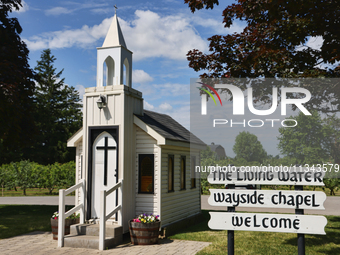 The Living Water Wayside Chapel in Niagara-on-the-Lake, Ontario, Canada, is holding the Guinness Book of World Records title for the smalles...