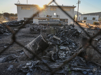 Industrial property is being damaged by a wildfire breaking out in Koropi near Athens, Greece, on June 19, 2024. (