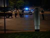 One female victim is dying and one female victim is getting injured in a shooting at a parking lot at 31st Street Beach in Chicago, Illinois...