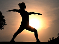 Yoga lovers are practicing yoga at Fengfeng Health Theme Cultural Park in Handan, China, on June 20, 2024. (