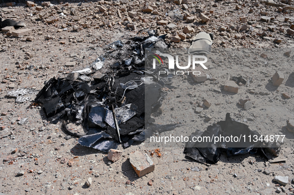 Rubble is covering the ground outside an administrative building of the State Research Control Institute of Veterinary Medicinal Products an...