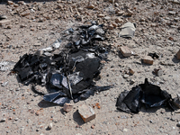 Rubble is covering the ground outside an administrative building of the State Research Control Institute of Veterinary Medicinal Products an...