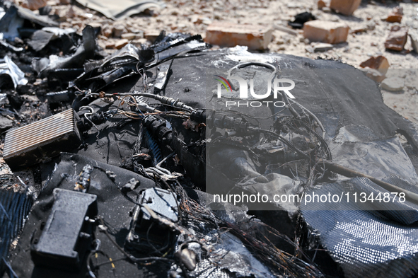 Rubble is covering the ground outside an administrative building of the State Research Control Institute of Veterinary Medicinal Products an...