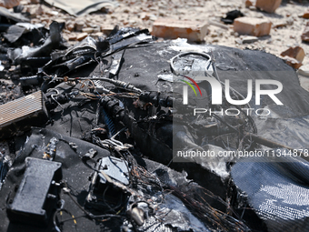 Rubble is covering the ground outside an administrative building of the State Research Control Institute of Veterinary Medicinal Products an...