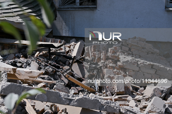 Rubble is covering the ground outside an administrative building of the State Research Control Institute of Veterinary Medicinal Products an...