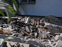 Rubble is covering the ground outside an administrative building of the State Research Control Institute of Veterinary Medicinal Products an...