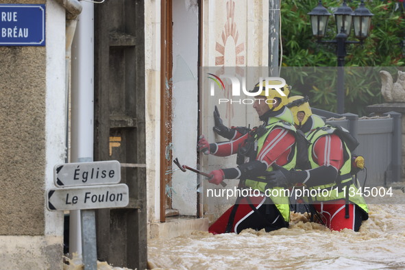 Firefighters are rescuing people after a huge storm in Narcy, France, on June 20, 2024. 