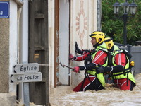 Firefighters are rescuing people after a huge storm in Narcy, France, on June 20, 2024. (