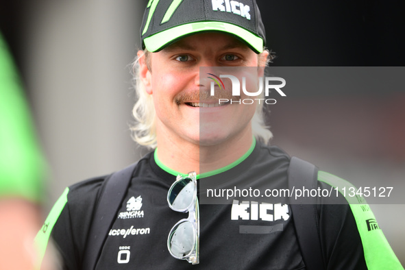 Valtteri Bottas of Stake F1 Team KICK Sauber is arriving into the paddock during Thursday media day of the Spanish GP, the 10th round of the...