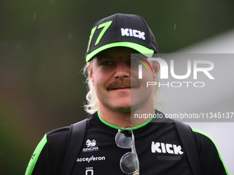 Valtteri Bottas of Stake F1 Team KICK Sauber is arriving into the paddock during Thursday media day of the Spanish GP, the 10th round of the...