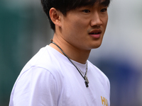 Yuki Tsunoda of Visa Cash-Up Racing Bulls is arriving into the paddock during Thursday media day of the Spanish GP, the 10th round of the Fo...