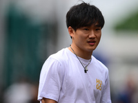 Yuki Tsunoda of Visa Cash-Up Racing Bulls is arriving into the paddock during Thursday media day of the Spanish GP, the 10th round of the Fo...