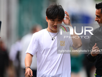 Yuki Tsunoda of Visa Cash-Up Racing Bulls is arriving into the paddock during Thursday media day of the Spanish GP, the 10th round of the Fo...