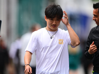 Yuki Tsunoda of Visa Cash-Up Racing Bulls is arriving into the paddock during Thursday media day of the Spanish GP, the 10th round of the Fo...