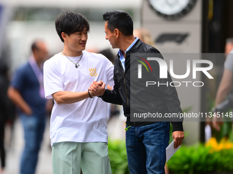 Yuki Tsunoda of Visa Cash-Up Racing Bulls is arriving into the paddock during Thursday media day of the Spanish GP, the 10th round of the Fo...