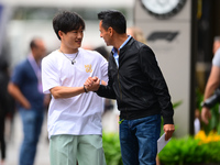 Yuki Tsunoda of Visa Cash-Up Racing Bulls is arriving into the paddock during Thursday media day of the Spanish GP, the 10th round of the Fo...