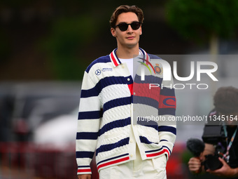 George Russell of Mercedes-AMG Petronas is arriving into the paddock during Thursday media day of the Spanish GP, the 10th round of the Form...