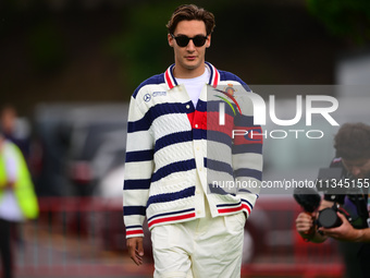 George Russell of Mercedes-AMG Petronas is arriving into the paddock during Thursday media day of the Spanish GP, the 10th round of the Form...