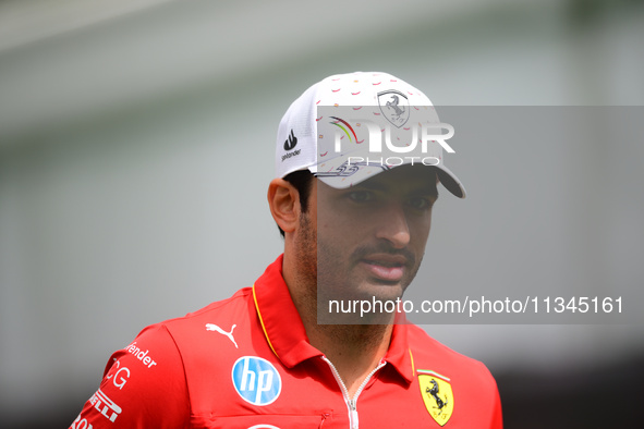 Carlos Sainz of Scuderia Ferrari is arriving into the paddock during Thursday media day of the Spanish GP, the 10th round of the Formula 1 W...