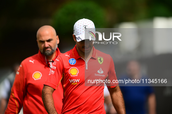 Carlos Sainz of Scuderia Ferrari is arriving into the paddock during Thursday media day of the Spanish GP, the 10th round of the Formula 1 W...