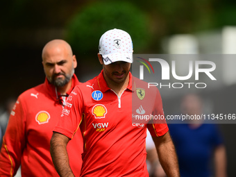 Carlos Sainz of Scuderia Ferrari is arriving into the paddock during Thursday media day of the Spanish GP, the 10th round of the Formula 1 W...