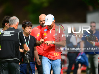 Carlos Sainz of Scuderia Ferrari is arriving into the paddock during Thursday media day of the Spanish GP, the 10th round of the Formula 1 W...