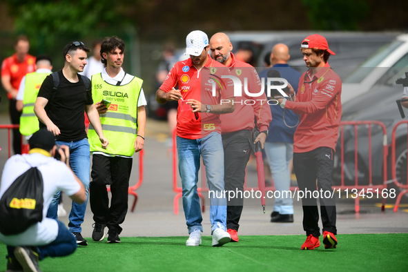 Carlos Sainz of Scuderia Ferrari is arriving into the paddock during Thursday media day of the Spanish GP, the 10th round of the Formula 1 W...