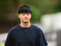 Guanyu Zhou of Stake F1 Team KICK Sauber is arriving into the paddock during Thursday media day of the Spanish GP, the 10th round of the For...