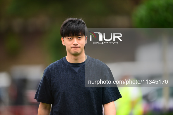 Guanyu Zhou of Stake F1 Team KICK Sauber is arriving into the paddock during Thursday media day of the Spanish GP, the 10th round of the For...