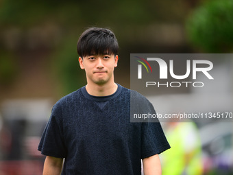 Guanyu Zhou of Stake F1 Team KICK Sauber is arriving into the paddock during Thursday media day of the Spanish GP, the 10th round of the For...