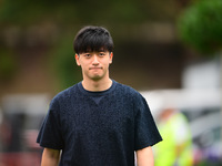 Guanyu Zhou of Stake F1 Team KICK Sauber is arriving into the paddock during Thursday media day of the Spanish GP, the 10th round of the For...