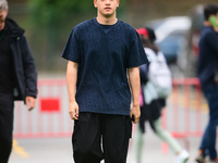 Guanyu Zhou of Stake F1 Team KICK Sauber is arriving into the paddock during Thursday media day of the Spanish GP, the 10th round of the For...