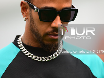 Lewis Hamilton of Mercedes-AMG Petronas F1 Team is arriving into the paddock during Thursday media day of the Spanish GP, the 10th round of...